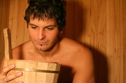 Man in Sauna  Close Up With Bucket